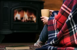 close-up-woman-covered-blanket_23-2148350495